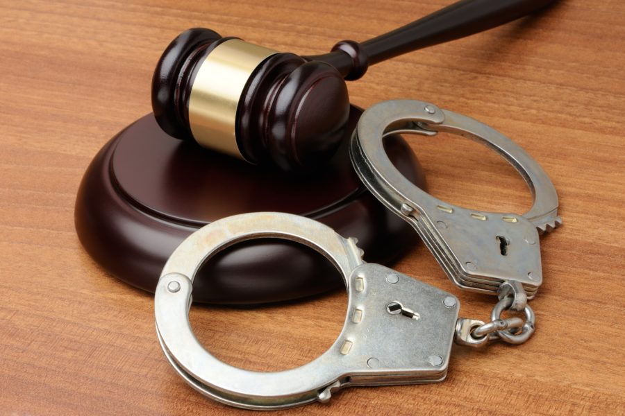 Wooden Gavel with Steel Handcuffs | Los Angeles Theft Crimes Lawyer​​ | Wegman & Levin