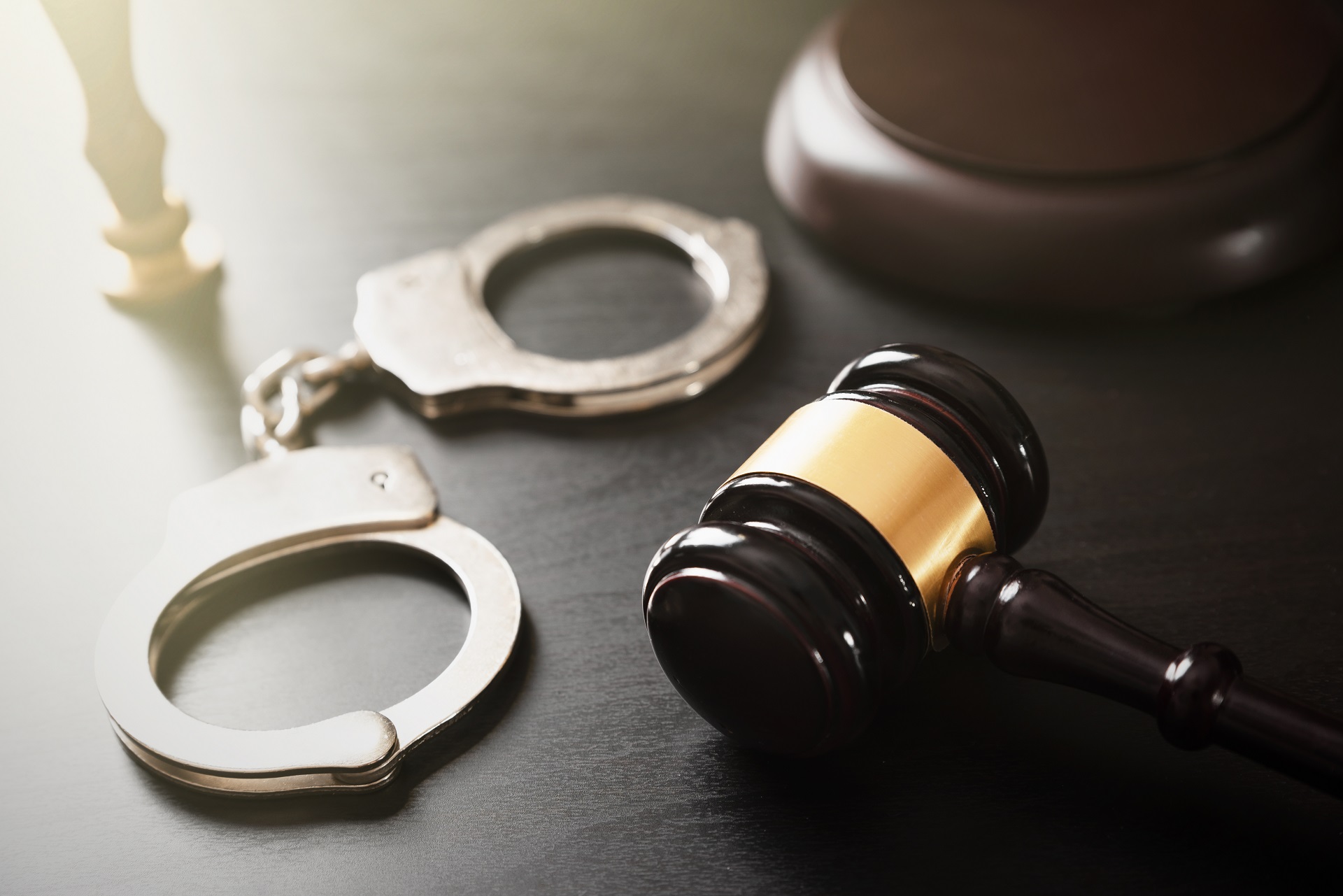 Judge Gavel with Steel Handcuffs | Sex Crime Lawyer in Los Angeles​​ California | Wegman & Levin