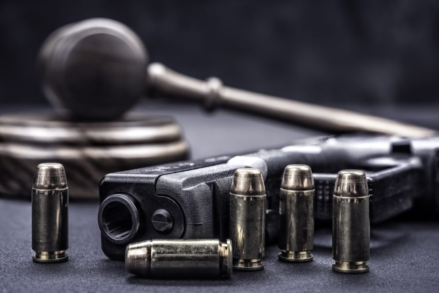 Judge Gavel With Firearms | Los Angeles Theft Crimes Lawyer in California​​​​​​ | Wegman & Levin