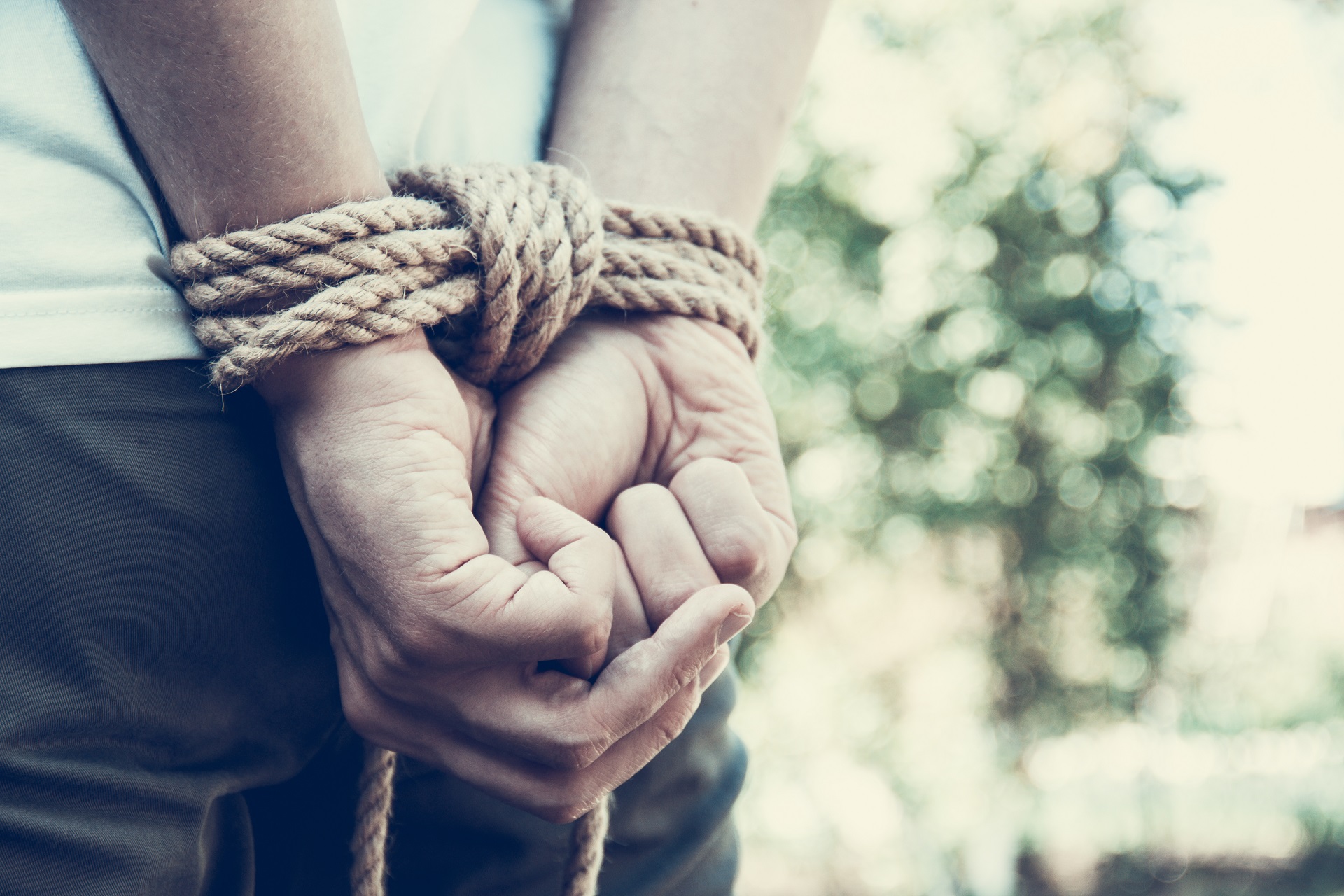 A Child's Hands Tied Up with Rope | Criminal Attorney in Los Angeles California​​​​ | Wegman & Levin
