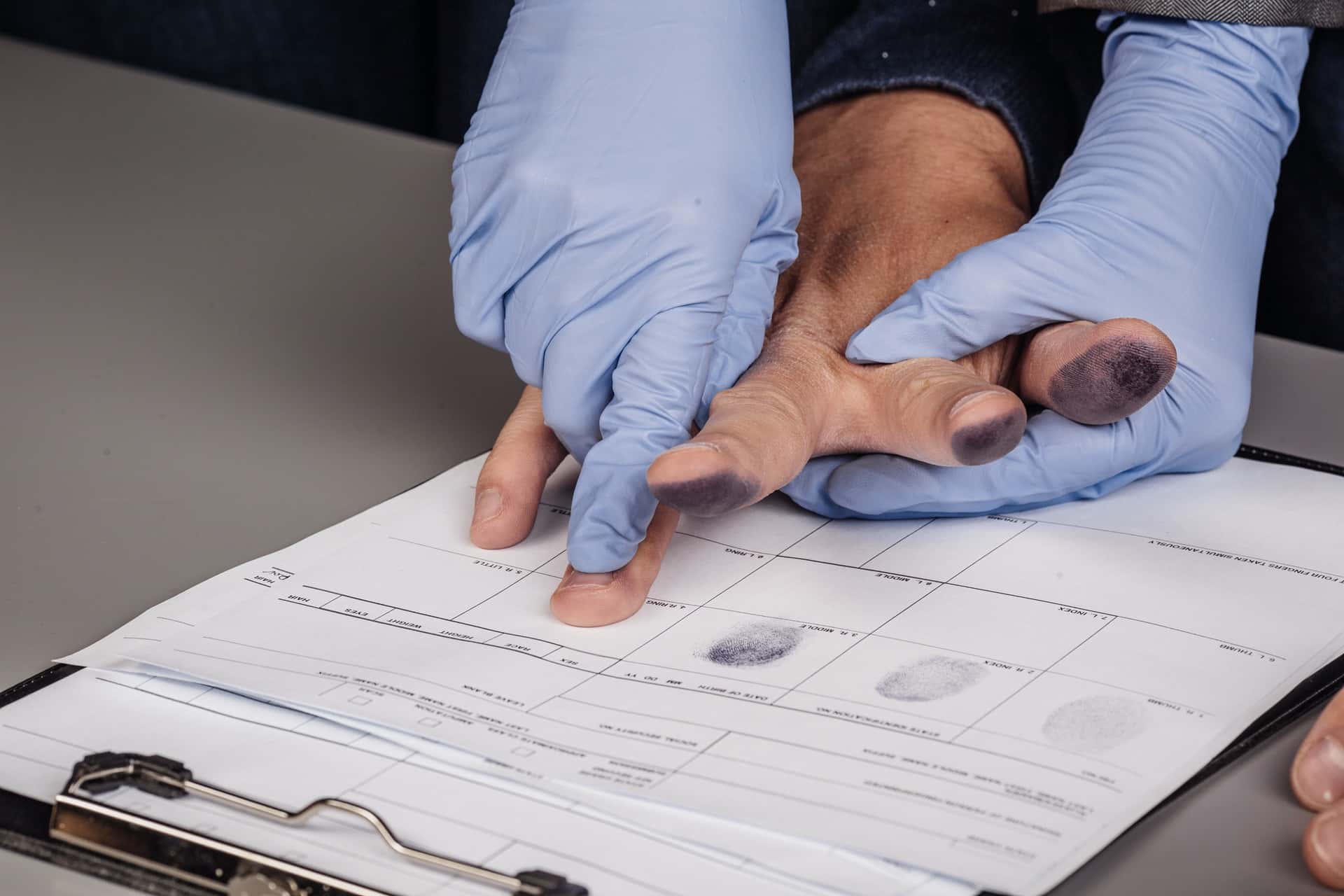 Police Takes Fingerprints of A Criminal | Battery Lawyer​​ in Los Angeles​​​​ | Wegman & Levin