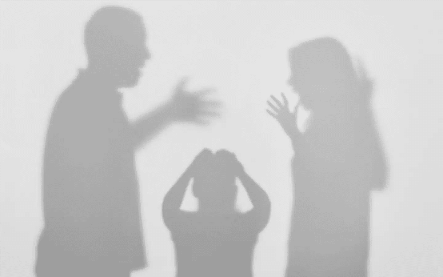 Shadow of Parents Arguing with Son in the Middle | Domestic Abuse Lawyer in LA | Wegman & Levin